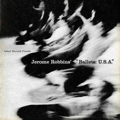 Programs depicts: A blurred photograph of a group of people sliding on their knees