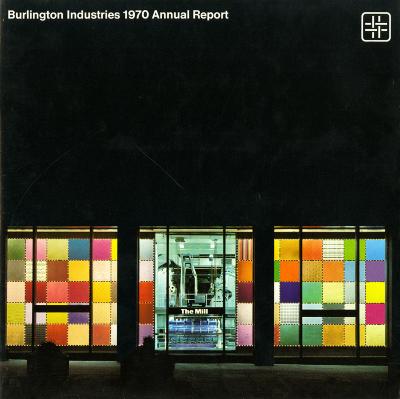 Announcements and invitations depicts: Photo of a Burlington storefront at night lit up. The windows are made up of multicolor squares with the inside exposed.