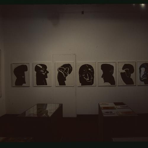 Photographic Materials depicts: artworks displayed in gallery