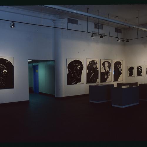 Photographic Materials depicts: artworks displayed in gallery