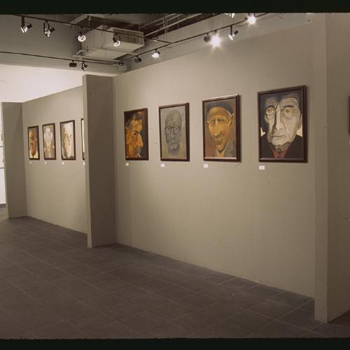 Photographic Materials depicts: artworks displayed in gallery