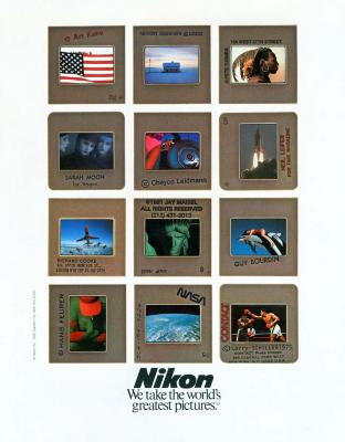 Advertisements depicts: 12 Nikon slides each with a colored photograph inside, one of the American flag, another of the statue of liberty, etc 