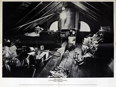 Posters depicts: A photograph of a cluttered attic with exhibition details below
