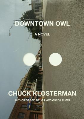 Book Covers depicts: View of a street taken from the road, image is sideways 