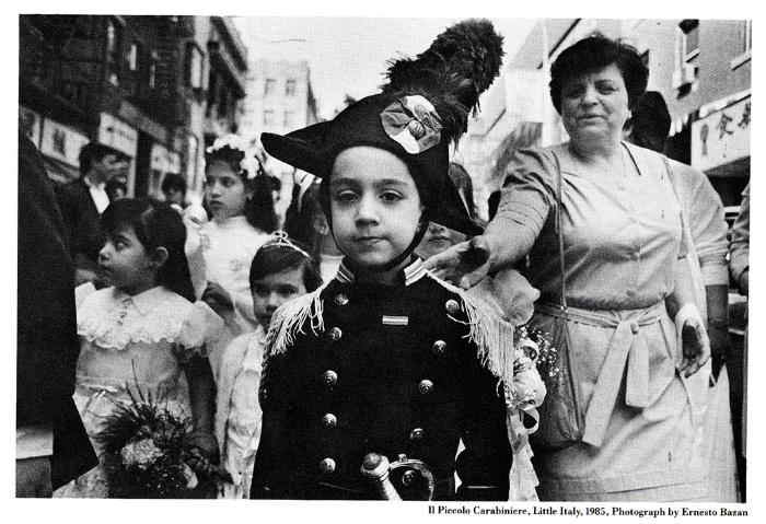 Announcements and invitations depicts: Boy wearing large ornamental hat and uniform