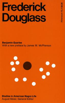 Book Covers depicts: Large brown dot surrounded by white dots on orange background with title in black