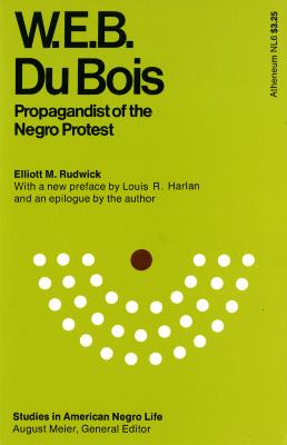 Book Covers depicts: Large brown dot in front of three half-circle rows (as if an audience) of white dots