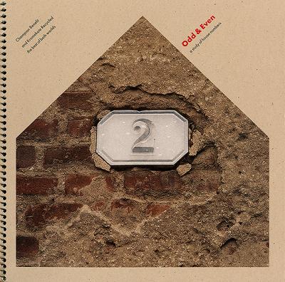 Booklet/Brochure depicts: A house shape made out of bricks, a signs with the number 2 carved into it sits in the center of the house 