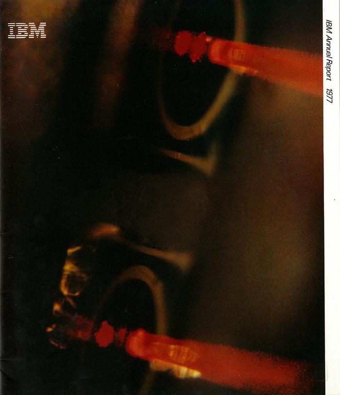Annual Reports and Corporate Communications depicts: Abstract image featuring two red light "smears"