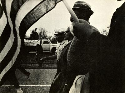 Announcements and invitations depicts: A photograph of Martin Luther King Jr. and others marching in a line