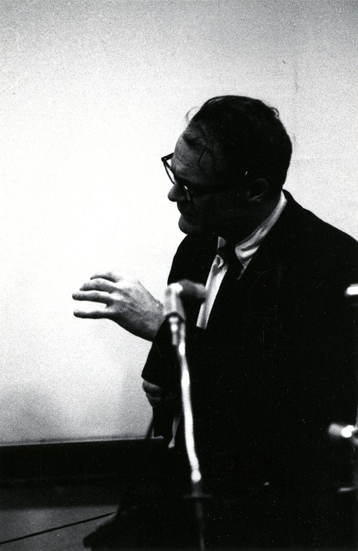Photographic Materials depicts: black and white photo of Robert Lowell in profile