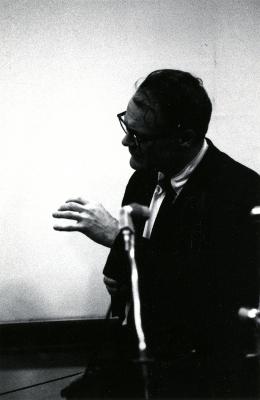 Photographic Materials depicts: black and white photo of Robert Lowell in profile