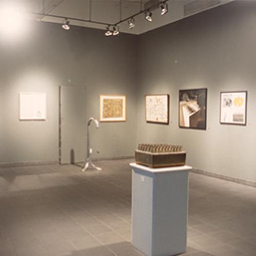 Photographic Materials depicts: artworks displayed in gallery