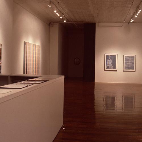 Photographic Materials depicts: artworks installed in a gallery