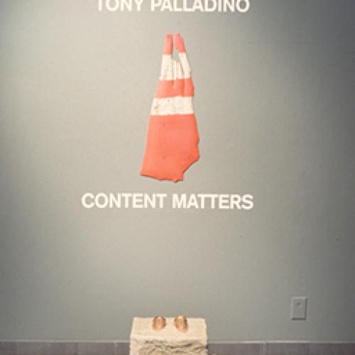 Photographic Materials depicts: artworks displayed in gallery