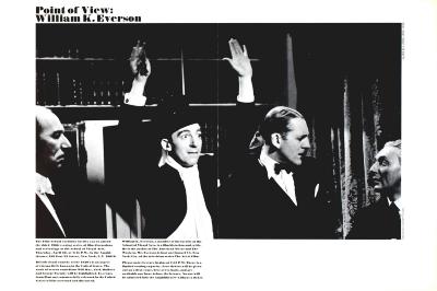 Posters depicts: black and white movie still with a man in a top hat holding up his hands