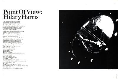 Posters depicts: Abstract black and white photo of a man looking through a hole, holding a tool