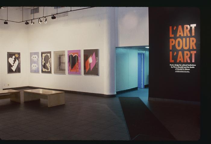 Photographic Materials depicts: artworks displayed in a gallery