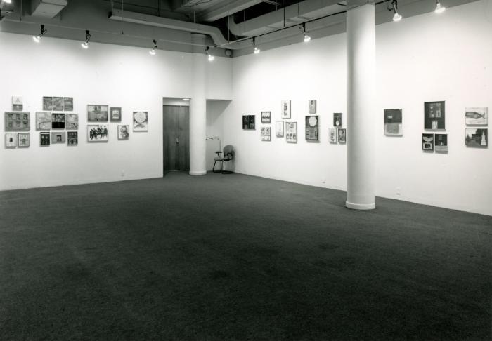 Photographic Materials, Digital Files depicts: artworks installed in gallery