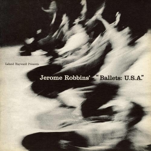Programs depicts: A blurred photograph of a group of people sliding on their knees