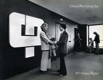 Annual Reports and Corporate Communications depicts: A man and woman in suits shake hands inside a building, behind them is the Colonial Penn logo 