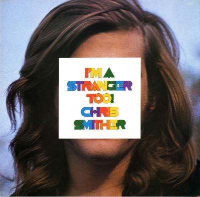 Album Covers depicts: Photograph of a man with with long hair. A square with the album title in colorful letters obscures his face