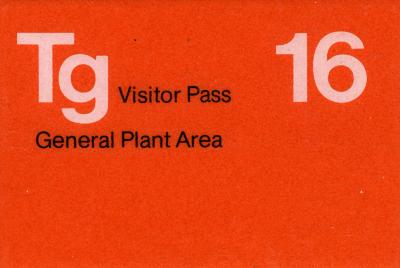 "Tg Visitor Pass 16 General Plant Area" printed on an orange slip of paper