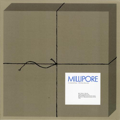 Graphic Standards Manuals, Logos and identities depicts: Illustration of a box with a black thread tied around it, in the bottom right is a label for "Millipore"