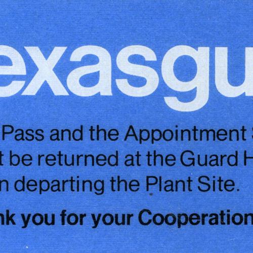 "Texasgulf" typed in large white font on a blue slip of paper with other text below 