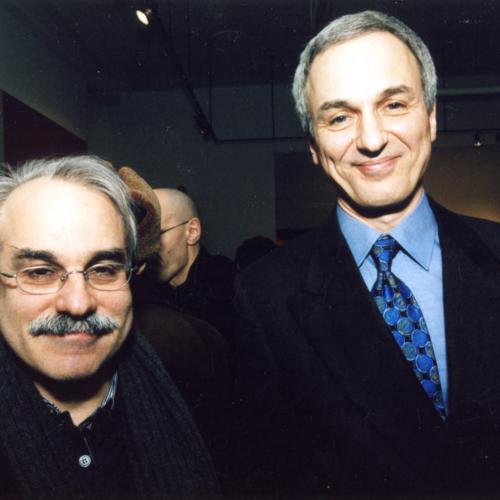 Photographic Materials depicts: two men looking into the camera