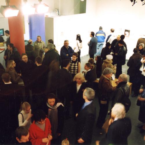 Photographic Materials depicts: overhead shot of gallery with guests