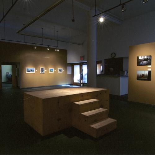 Photographic Materials depicts: photograph of artworks installed in gallery