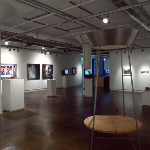 Photographic Materials depicts: photograph of gallery with artworks installed