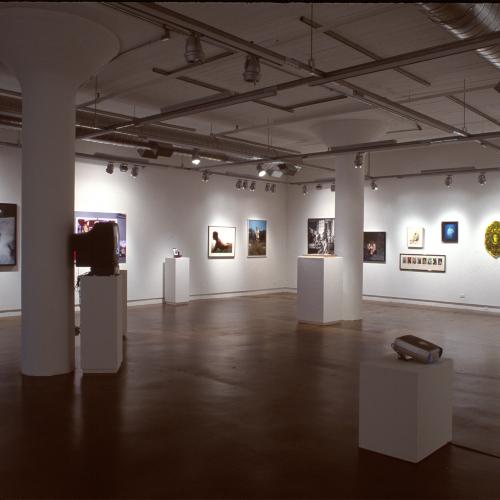 Photographic Materials depicts: photograph of gallery with artworks installed