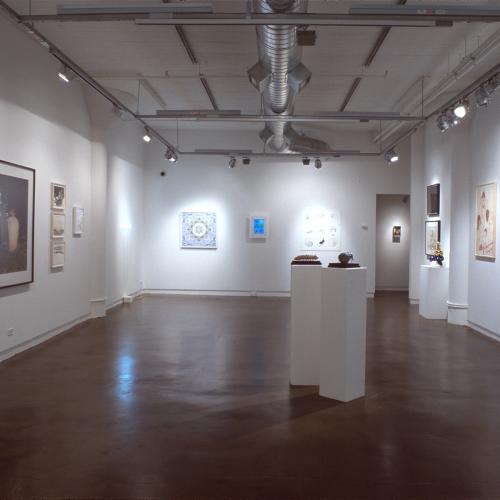 Photographic Materials depicts: photograph of gallery with artworks installed