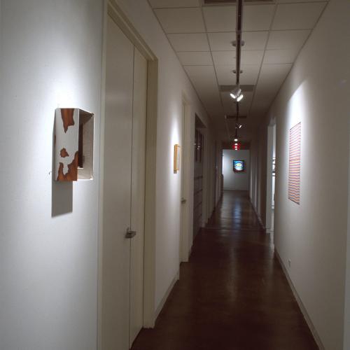 Photographic Materials depicts: photograph of gallery with artworks installed