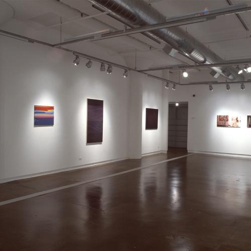Photographic Materials depicts: photograph of gallery with artworks installed