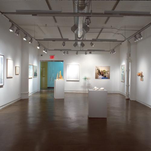 Photographic Materials depicts: photograph of gallery with artworks installed