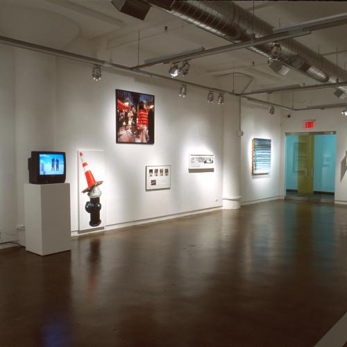Photographic Materials depicts: photograph of gallery with artworks installed