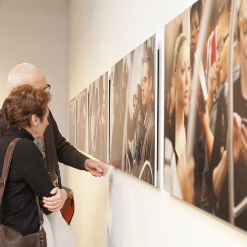 Digital Files, Photographic Materials depicts: people looking at artworks in gallery
