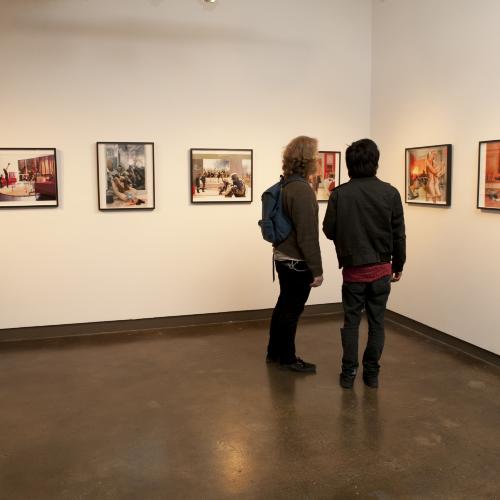 Digital Files, Photographic Materials depicts: people looking at artworks in gallery