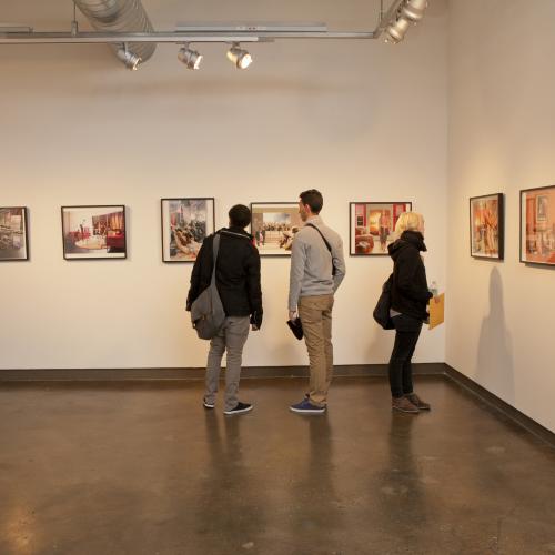 Digital Files, Photographic Materials depicts: people looking at artworks in gallery
