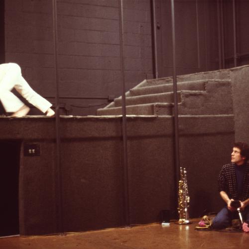 Photographic Materials depicts: woman crawling on platform