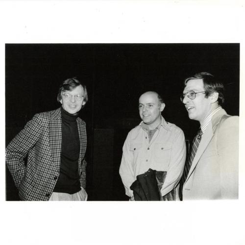 Photographic Materials depicts: black and white photograph with three men, (left to right) Elderfield, unknown, David Rhodes
