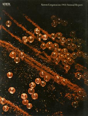 Annual Reports and Corporate Communications depicts: Many highly detailed shiny orange spheres and textured orange lines going from the upper left corner to the lower right corner on a black background with text at the top.