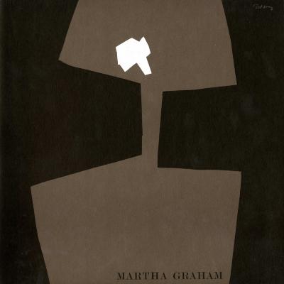 Programs depicts: Small abstract cutout white shape on an brown almost hourglass like cutout, all on a black background  