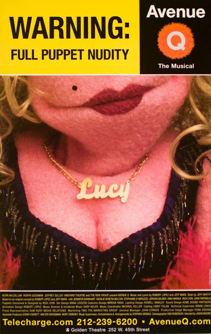 Posters depicts: Lady puppet with red lips, a mole, cleavage with a low cut dress, and a gold necklace that says Lucy.