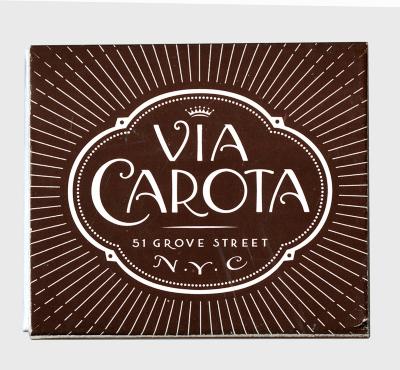 Packaging depicts: Swoopy logotype on a brown background