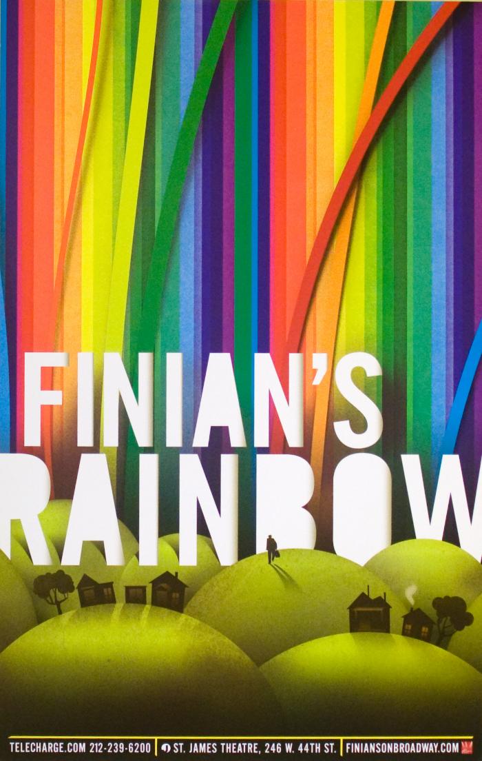 Posters depicts: Cut paper rainbow over green hills and tiny houses