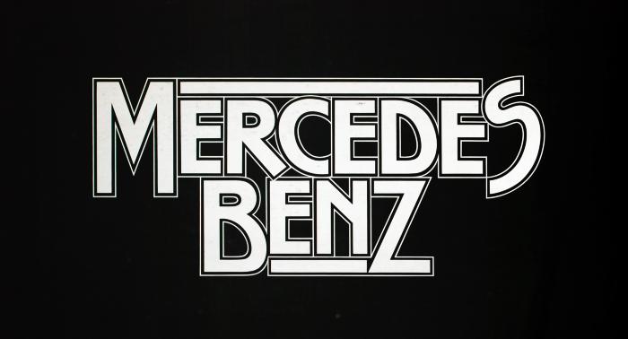 Logos and identities depicts: Mercedes Benz logotype in white type on black background